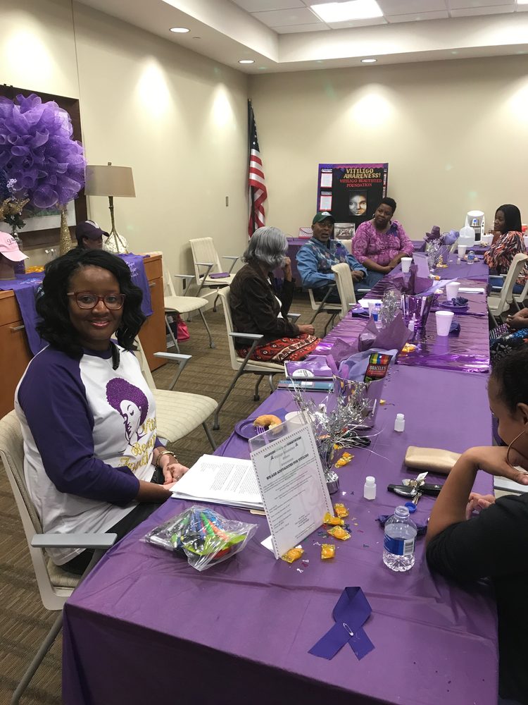Vitiligo Beautified members at a World Vitiligo Day event