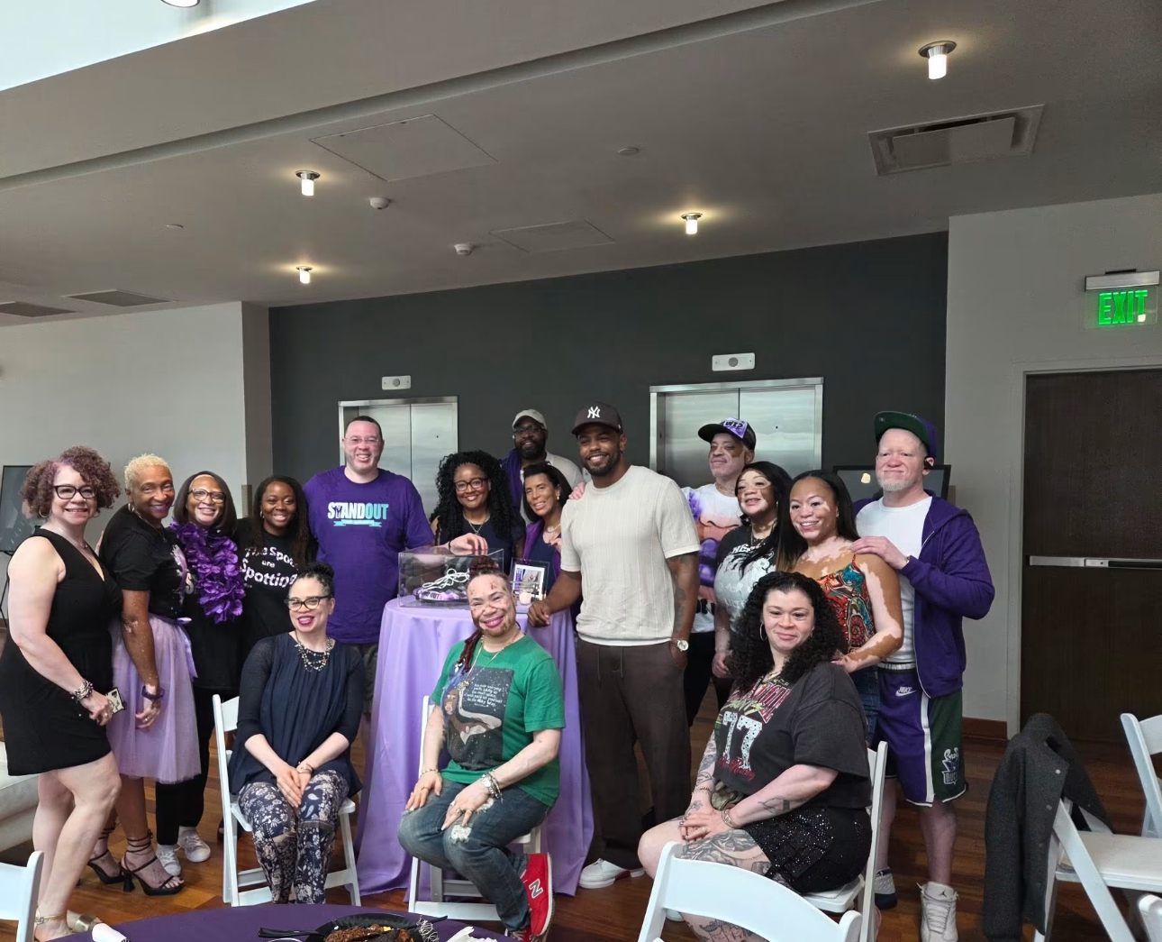 Community members gathered at a Victories Over Vitiligo conference event